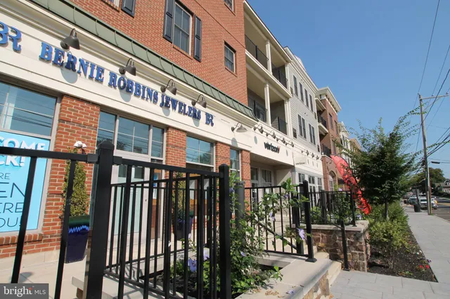 a front view of a building with street view