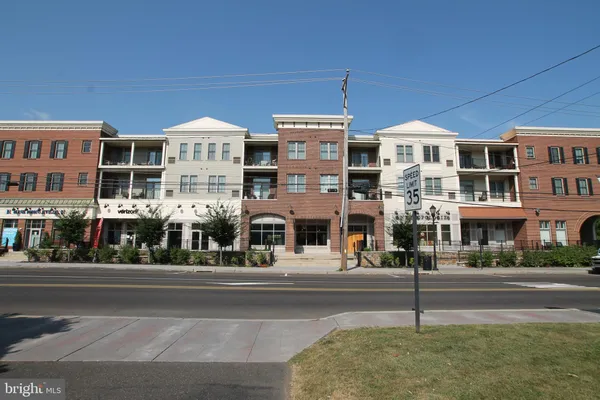 a view of a street in front of a building