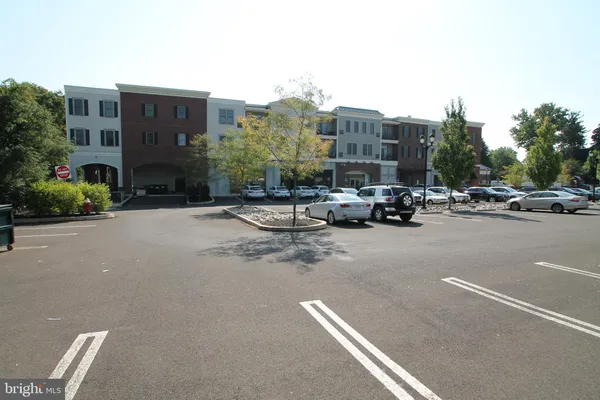 a view of a cars parked in front of a building