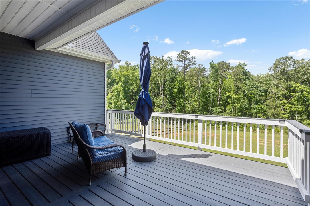 125 Estateside Drive Anderson, SC 29621 - Photo 33 of 37 An inviting deck offers a scenic outdoor retreat with lush green views.