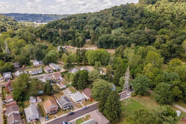 an aerial view of residential house with outdoor space