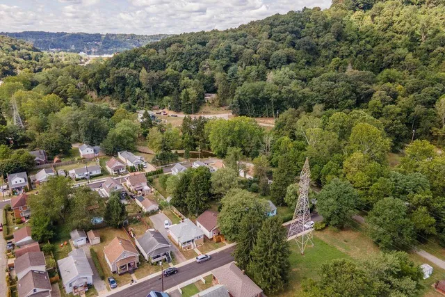 an aerial view of residential house with outdoor space