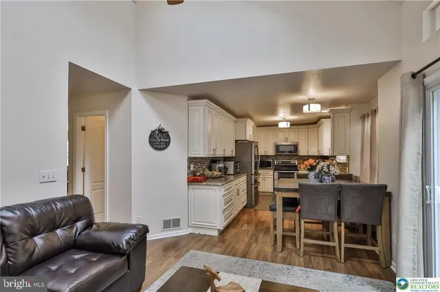 a living room with a fireplace