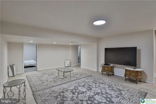 a bedroom with a bed and a cabinets