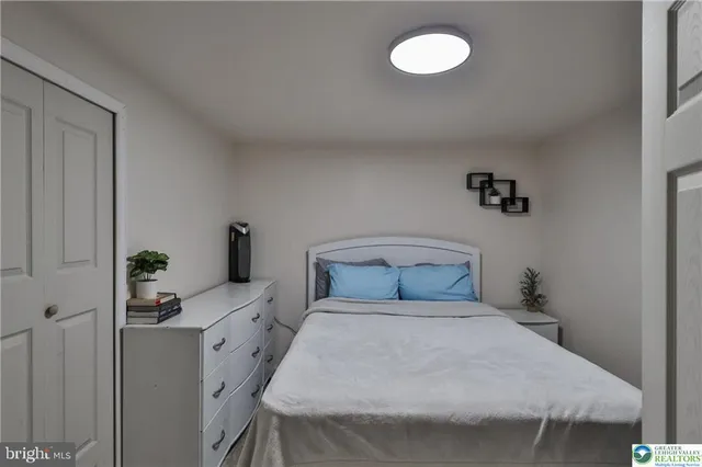 a view of deck with furniture and barbeque oven