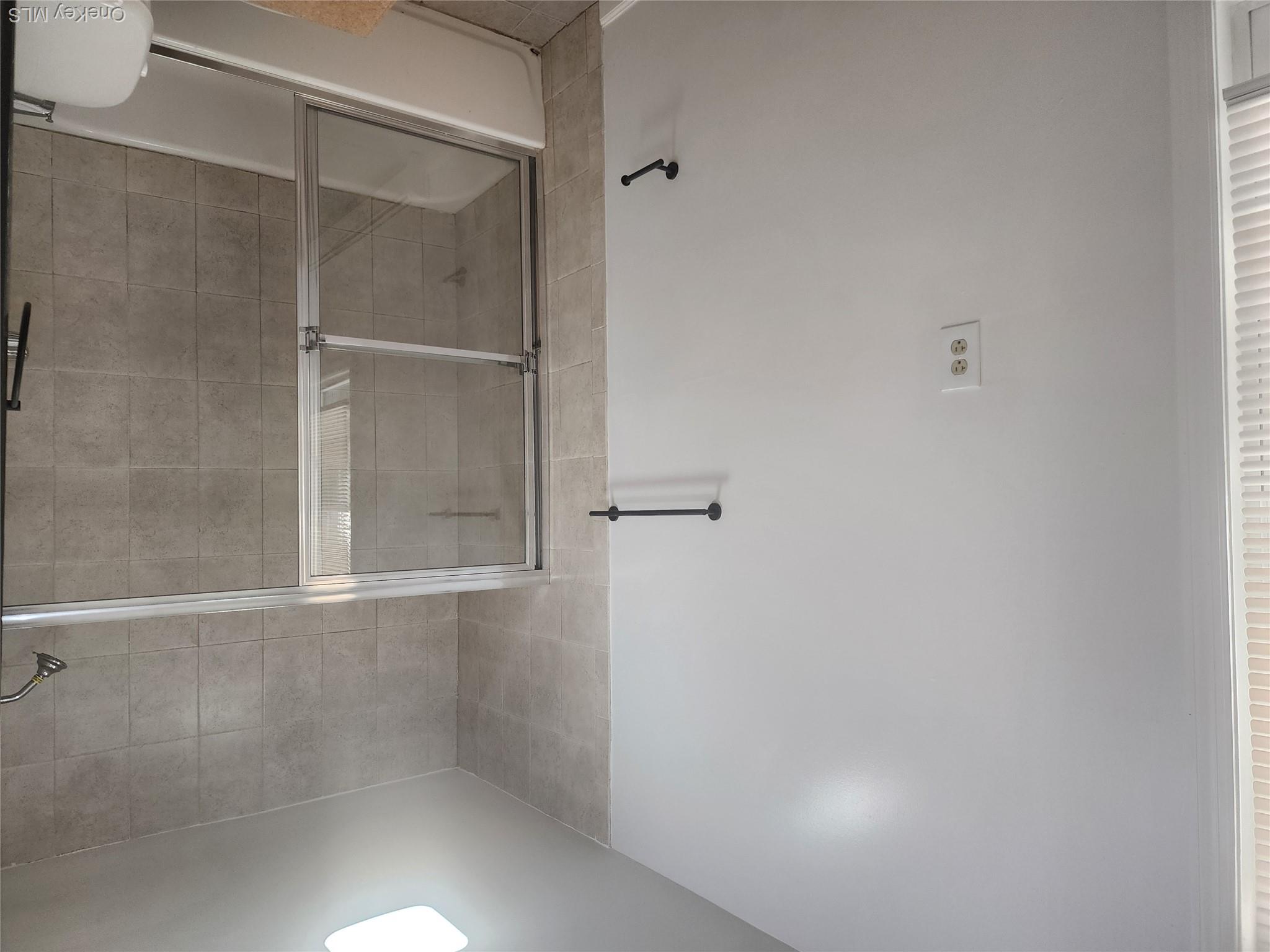 49 Carroll Street, Unit 1 Poughkeepsie, NY 12601 - Photo 11 of 15 a bathroom with a shower