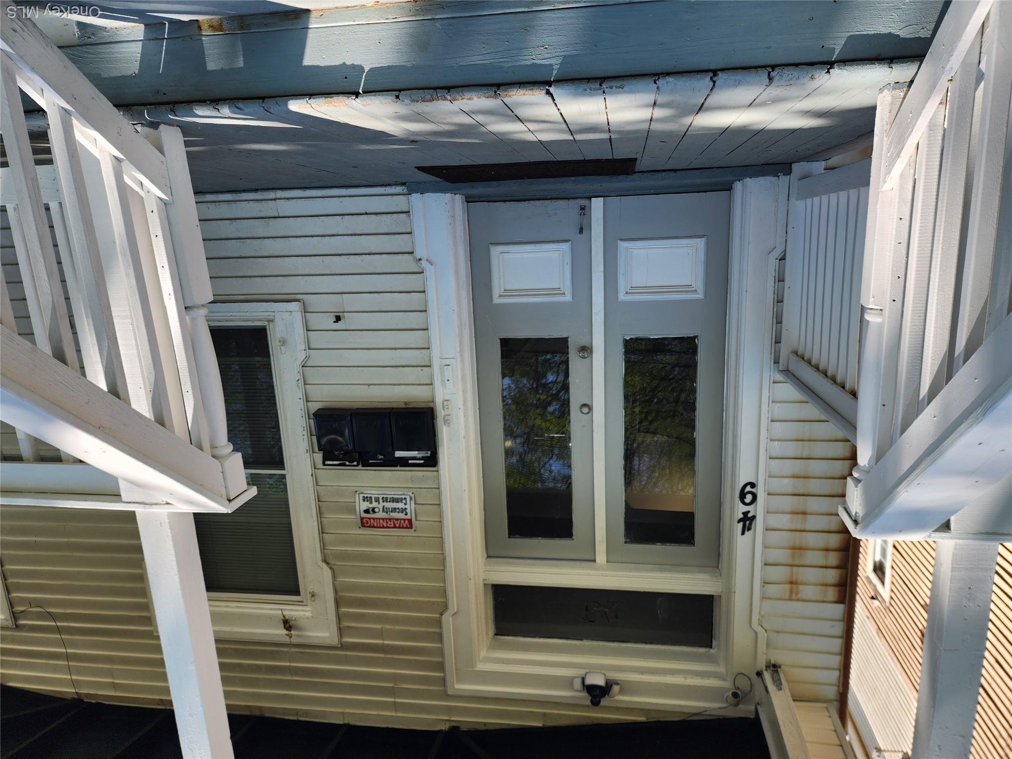 49 Carroll Street, Unit 1 Poughkeepsie, NY 12601 - Photo 3 of 15 a front view of a house with a door