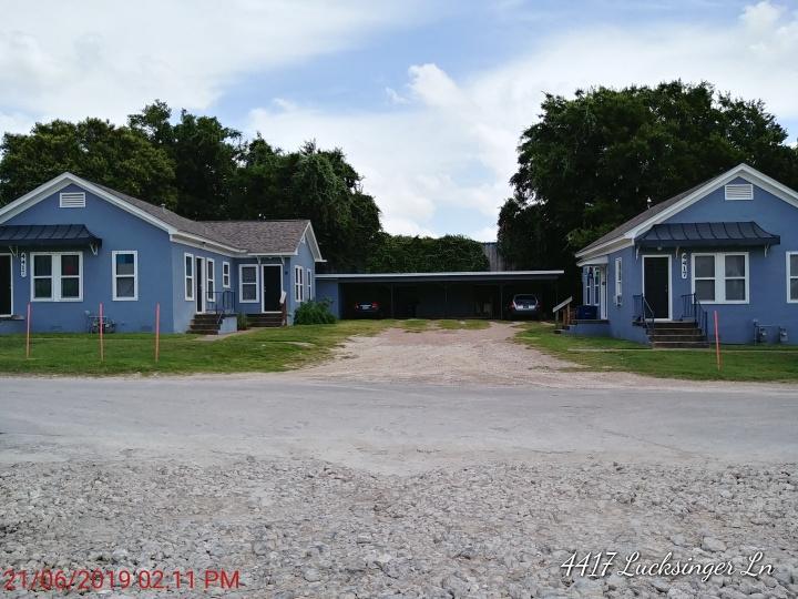 4417 Lucksinger Lane, Unit B Austin, TX 78745 - Photo 1 of 12 a front view of a house with garden