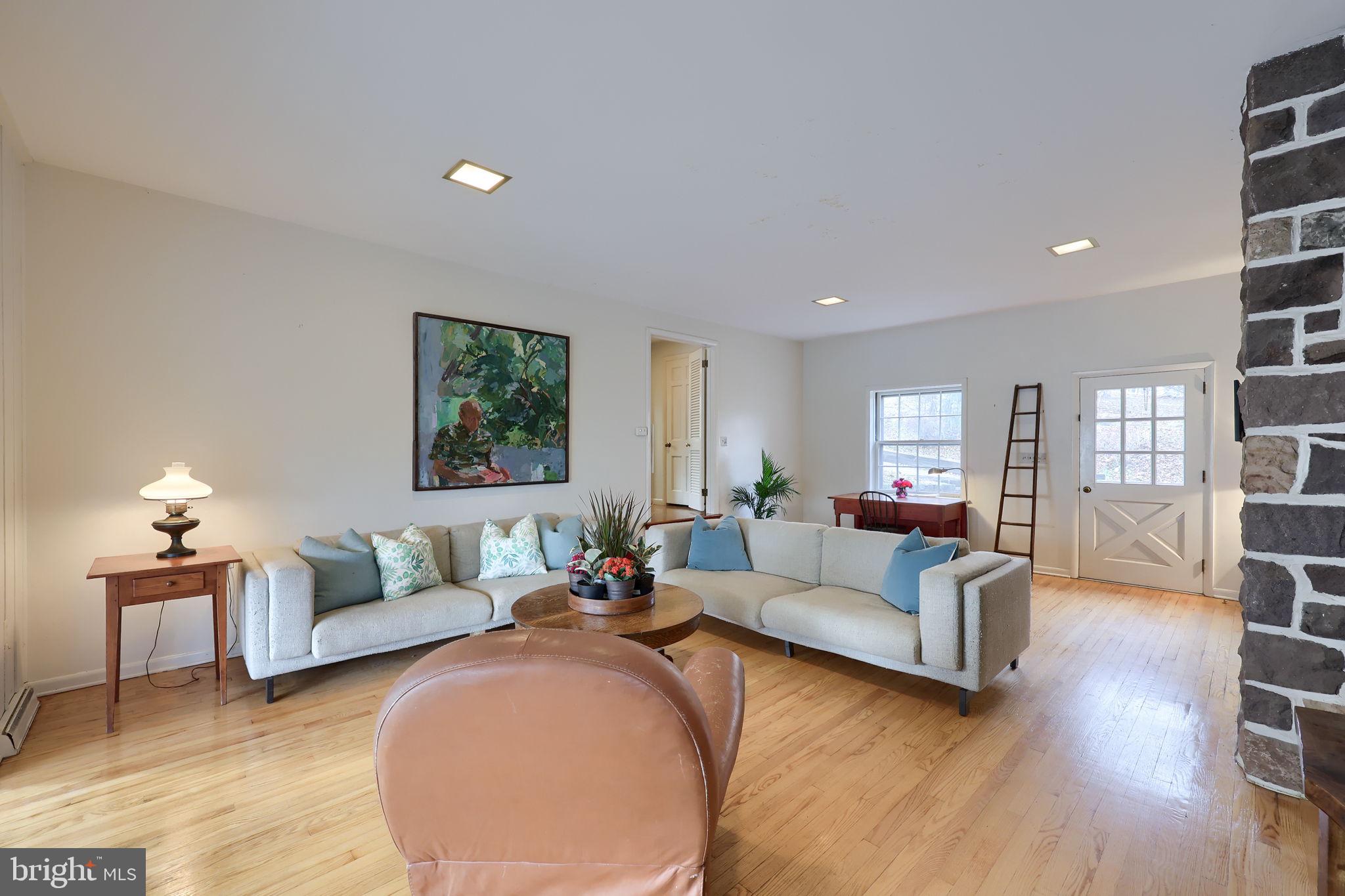 550 Speedwell Forge Road Lititz, PA 17543 - Photo 11 of 92 a living room with furniture and a wooden floor