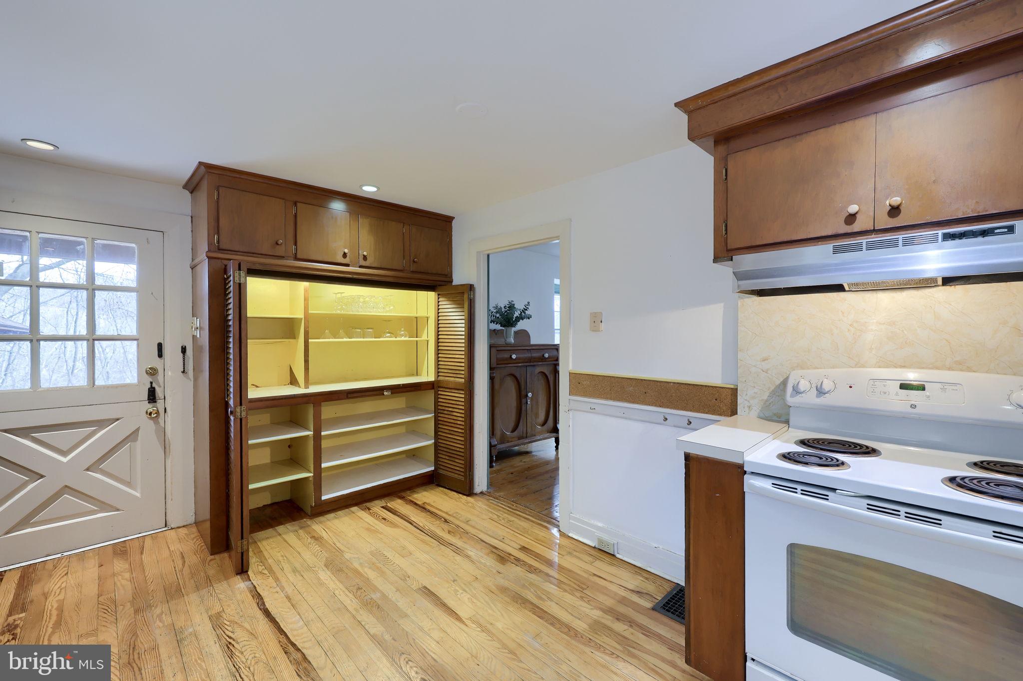 550 Speedwell Forge Road Lititz, PA 17543 - Photo 17 of 92 a kitchen with a wooden floor and a stove top oven