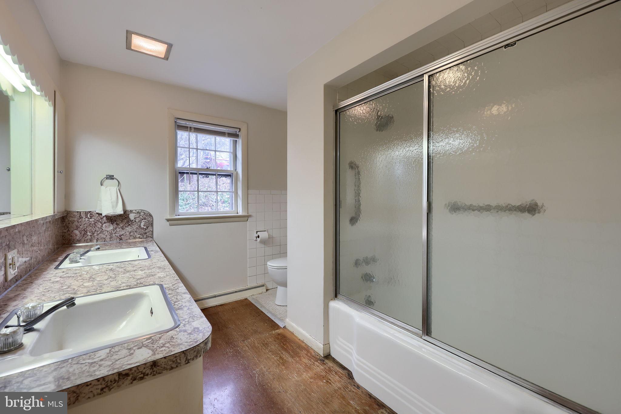 550 Speedwell Forge Road Lititz, PA 17543 - Photo 33 of 92 a bathroom with a granite countertop sink mirror vanity and toilet