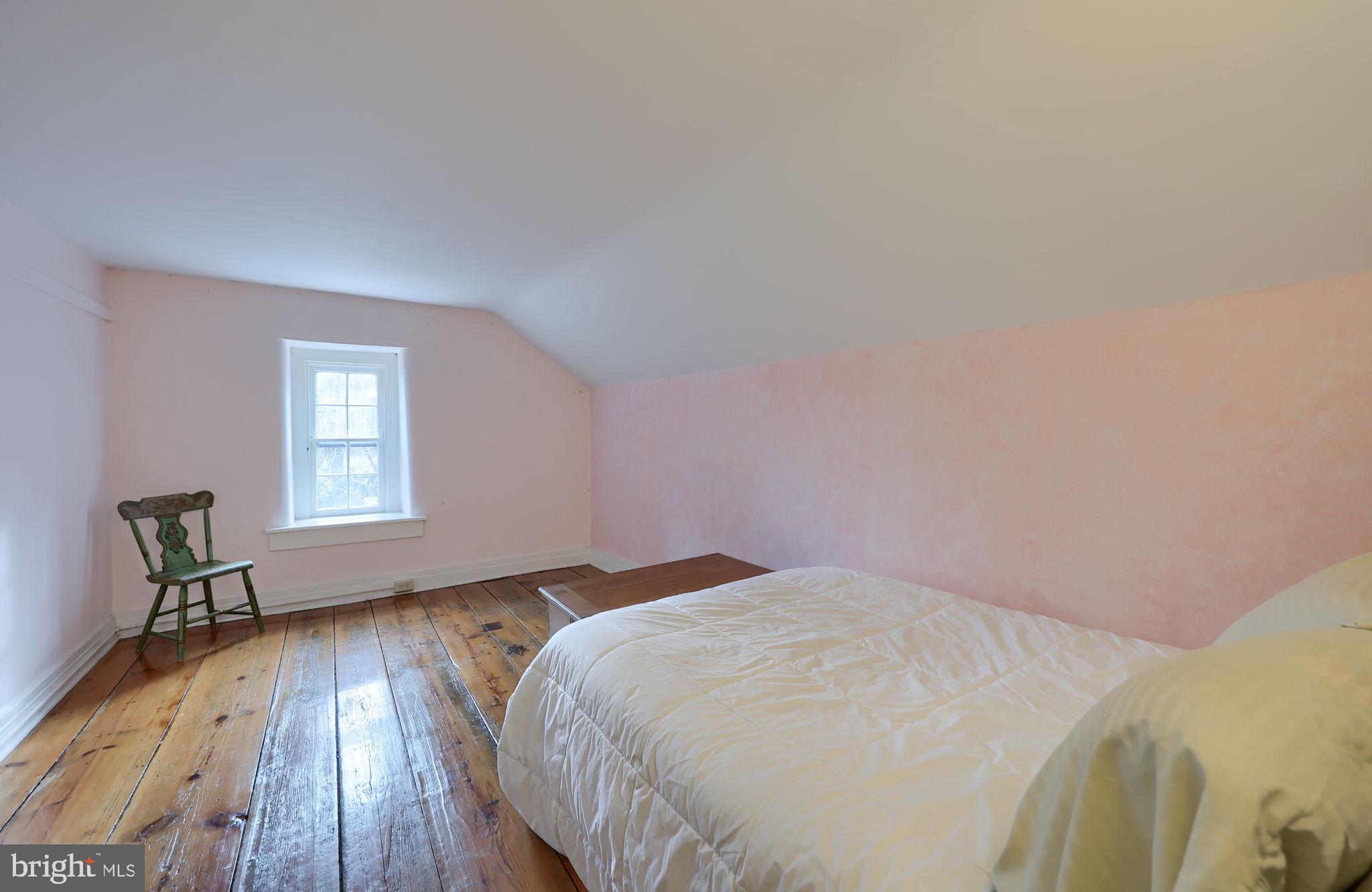 550 Speedwell Forge Road Lititz, PA 17543 - Photo 40 of 92 a bedroom with a bed and wooden floor