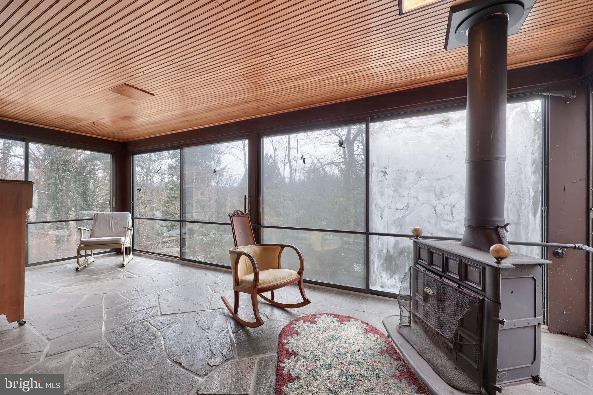 550 Speedwell Forge Road Lititz, PA 17543 - Photo 48 of 92 a living room with furniture a window and a chandelier