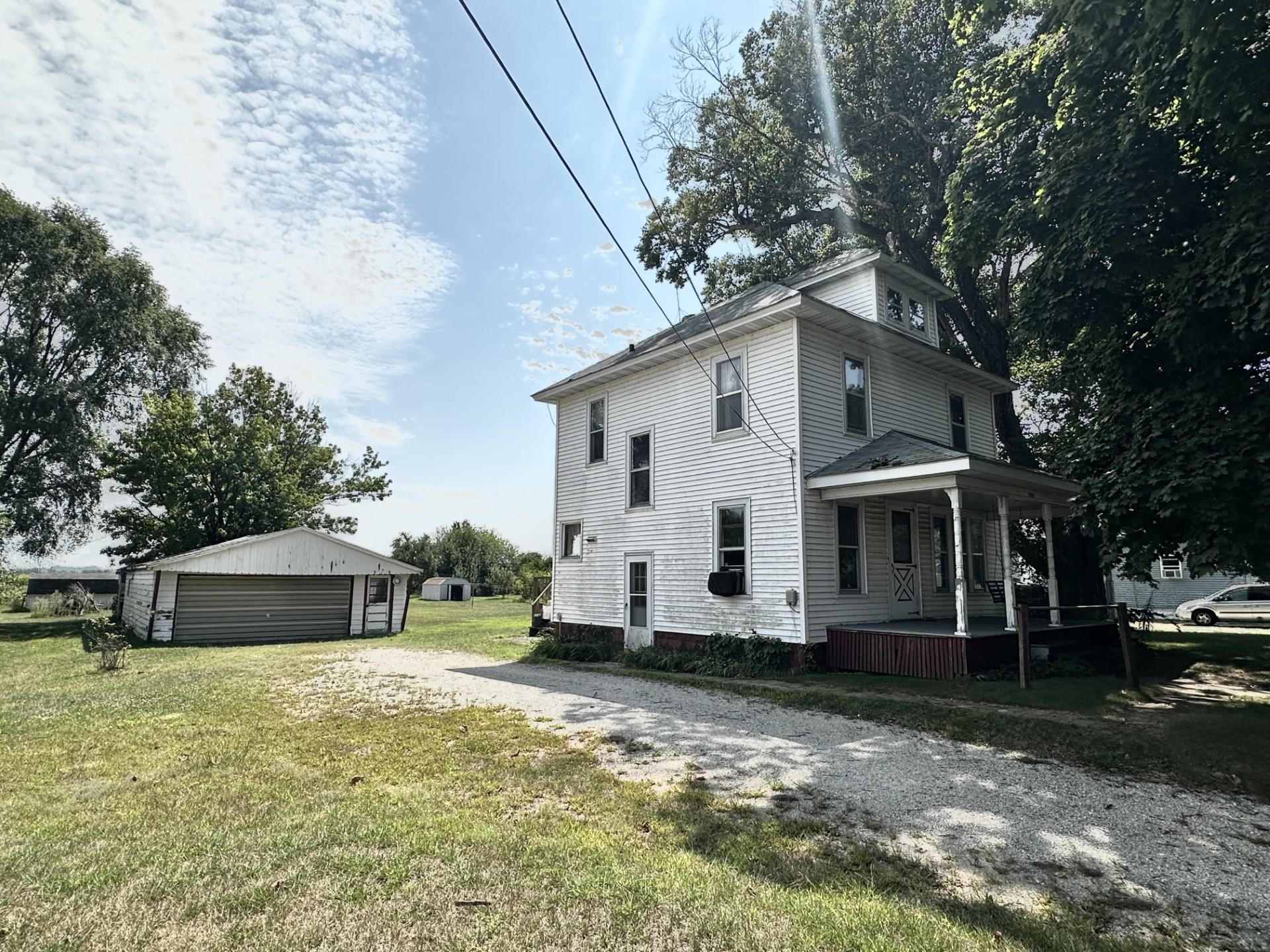 1898 Il Route Thomson, IL 61285 - Photo 16 of 18 a front view of a house with a yard