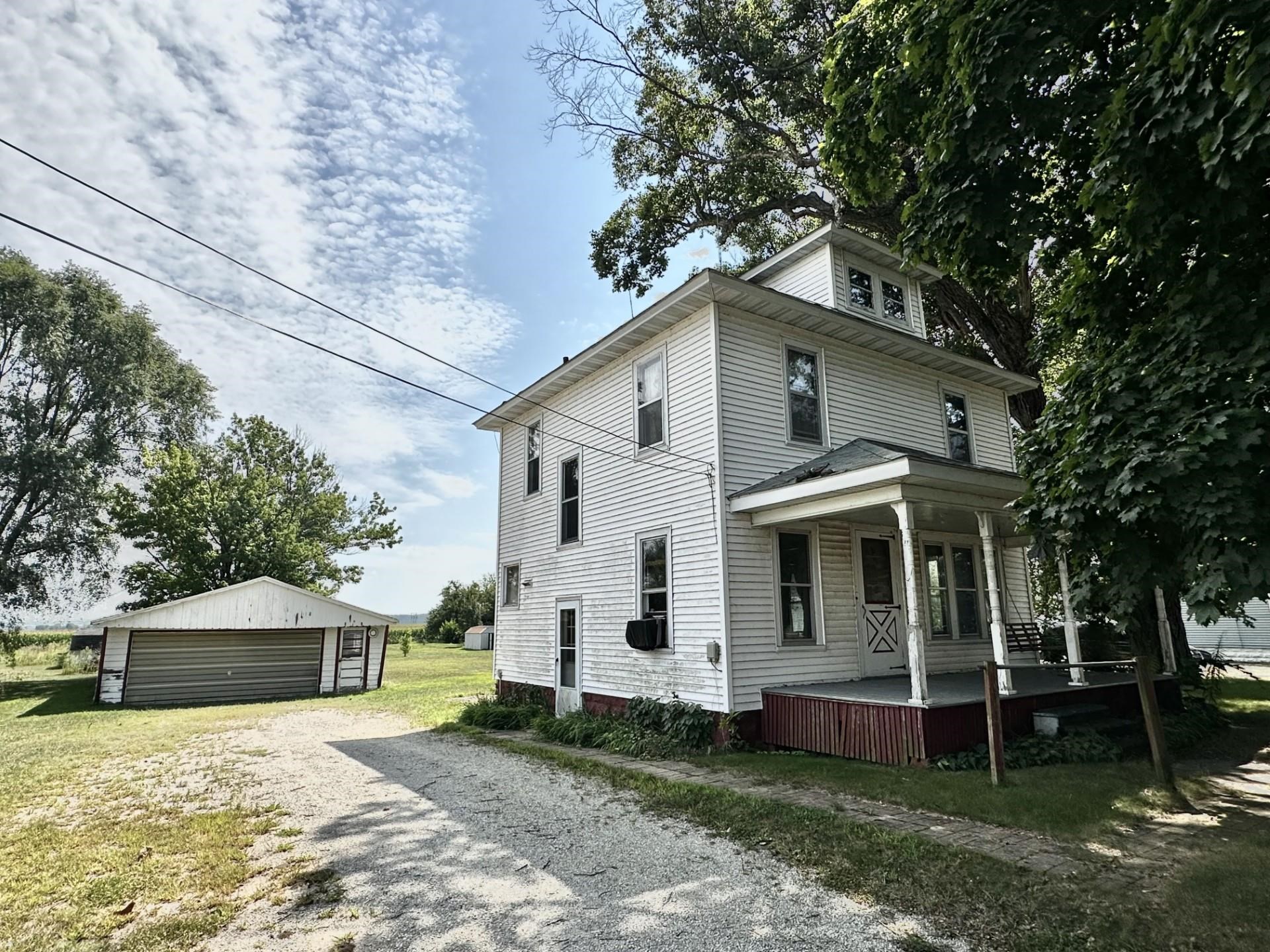 1898 Il Route Thomson, IL 61285 - Photo 18 of 18 a front view of a house with a yard