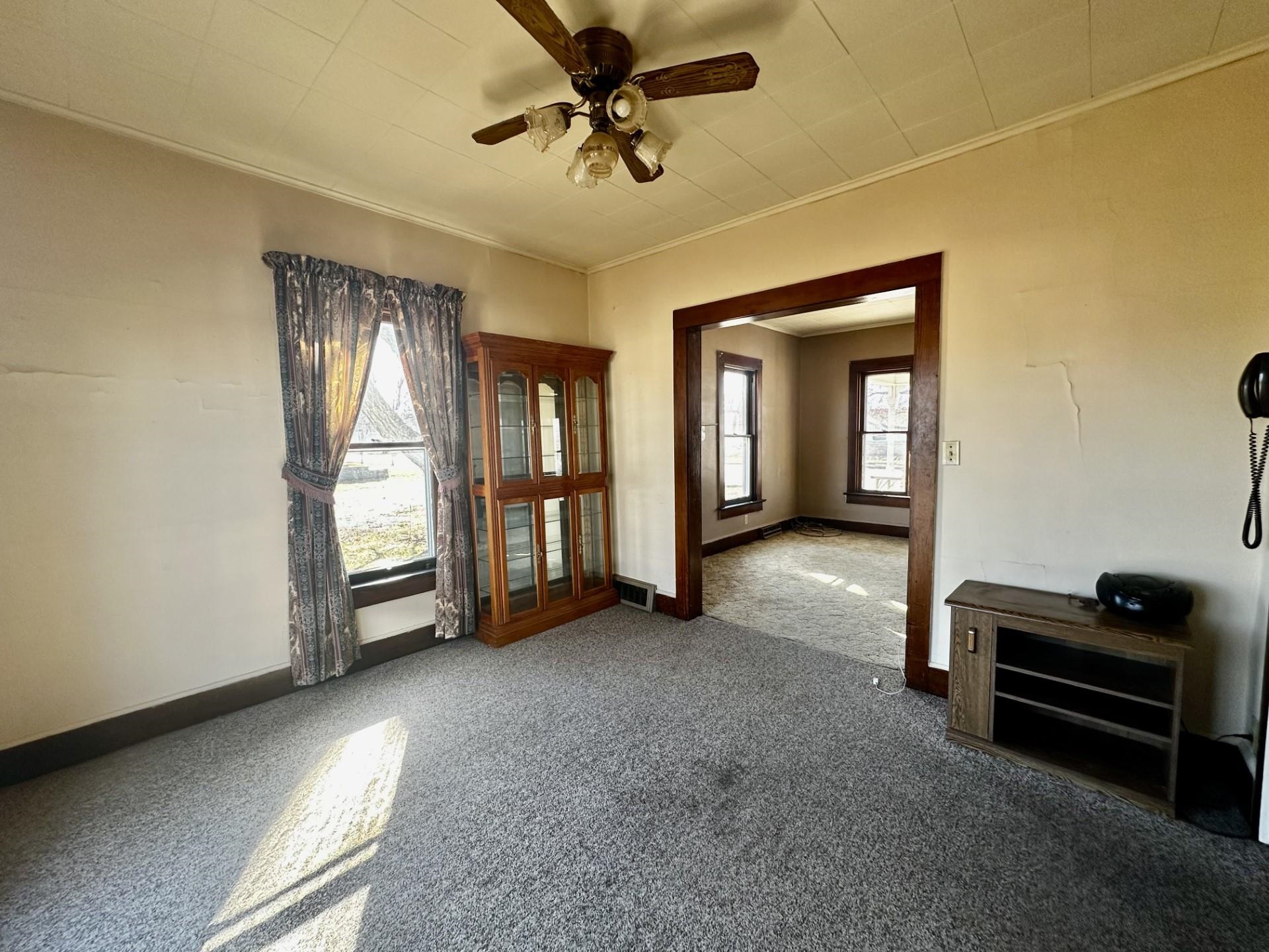 1898 Il Route Thomson, IL 61285 - Photo 7 of 18 a view of a livingroom with a projector and furniture