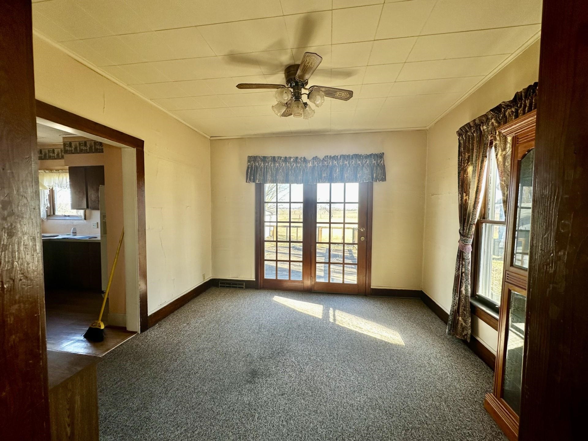 1898 Il Route Thomson, IL 61285 - Photo 8 of 18 an empty room with windows and closet