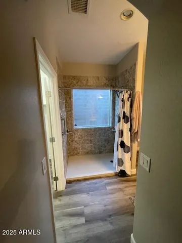 a view of entryway with a wooden floor