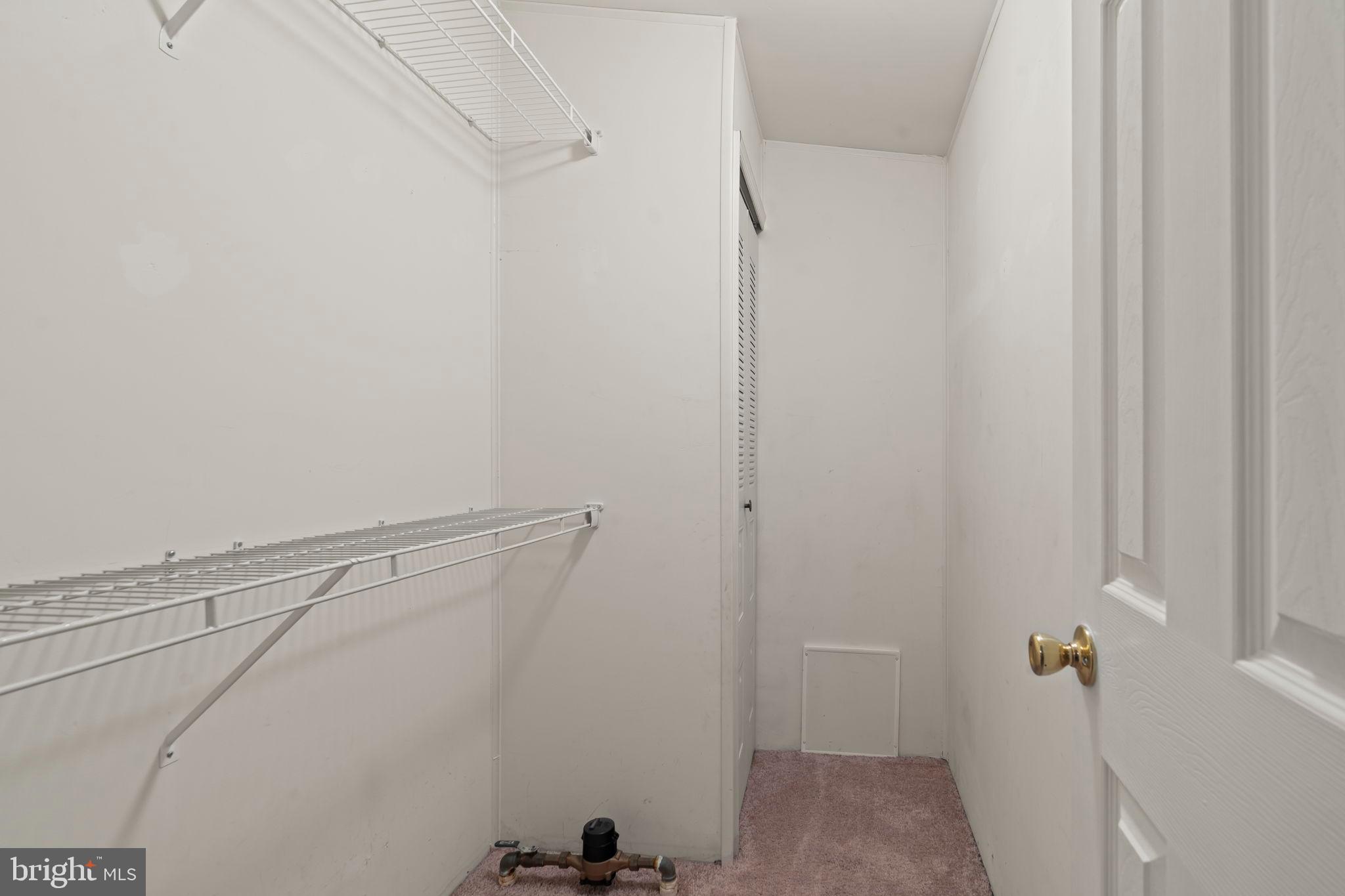 561 Spring Meadow Circle New Hope, PA 18938 - Photo 12 of 23 a view of a room with racks on the wall