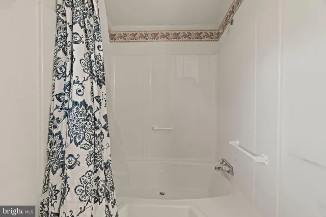 a bathroom with a bathtub