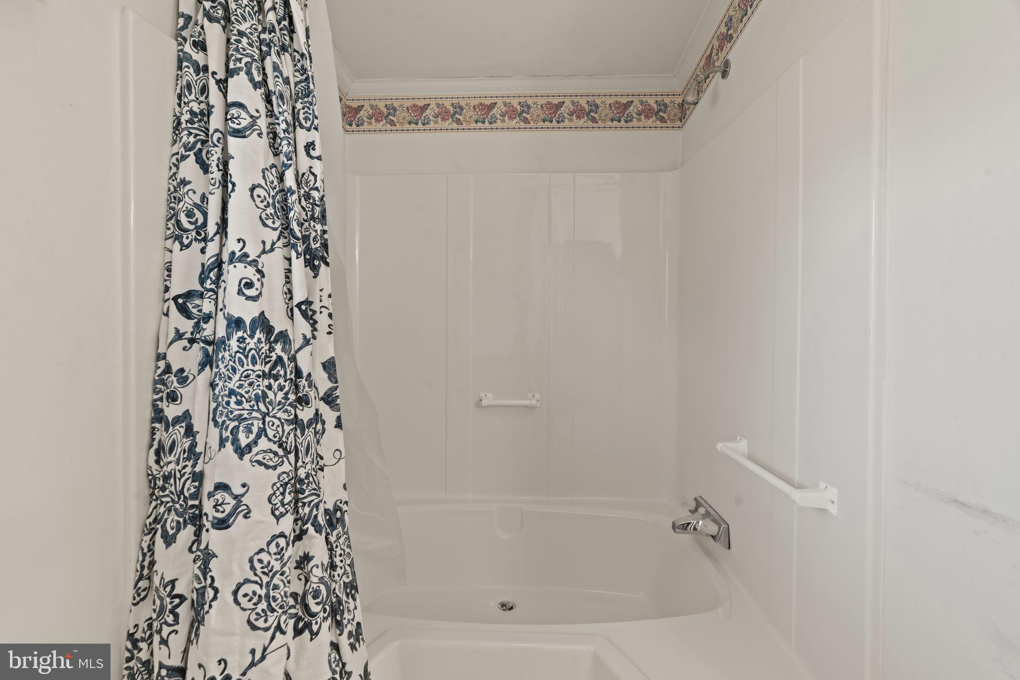561 Spring Meadow Circle New Hope, PA 18938 - Photo 18 of 23 a bathroom with a bathtub