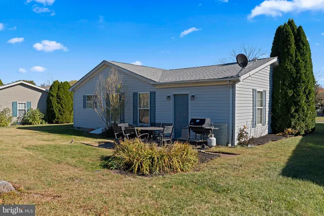 a view of swimming pool with outdoor seating