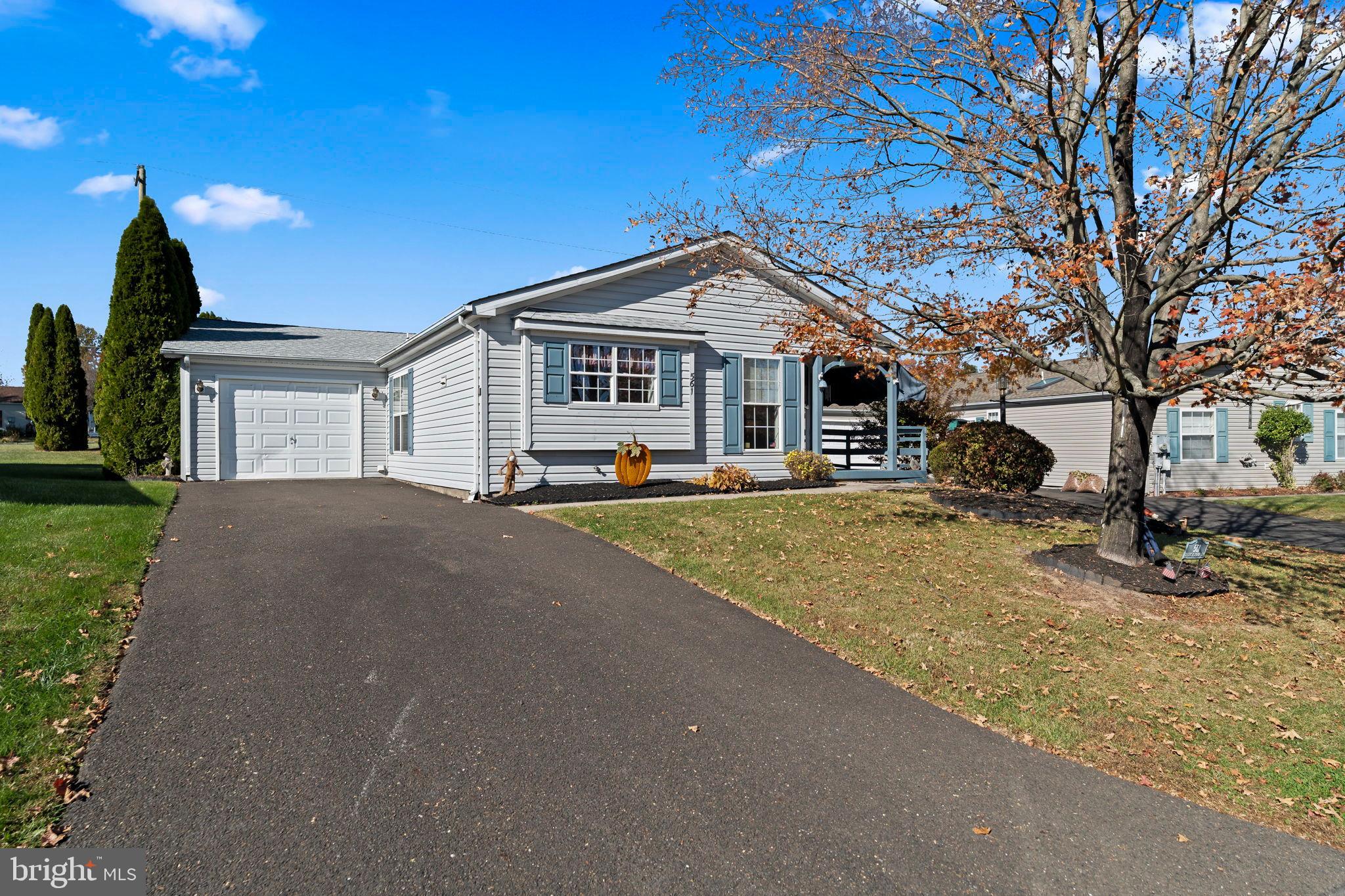 561 Spring Meadow Circle New Hope, PA 18938 - Photo 2 of 23 a front view of a house with a yard