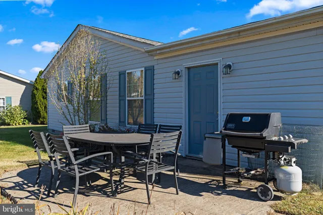 a view of a dinning tables and chairs in the patio