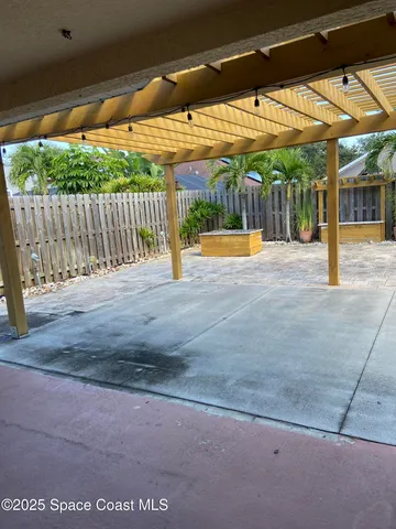 a view of a backyard with a small cabin