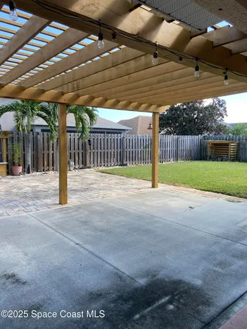 a view of a backyard of a house