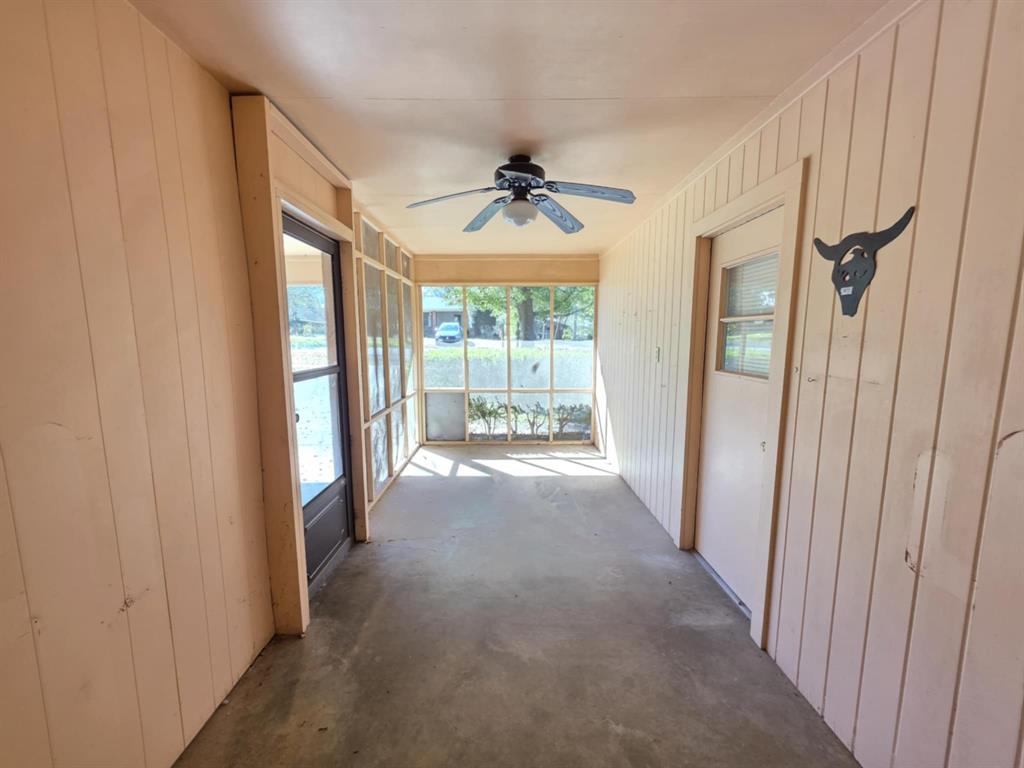 123 Frank Drive Logansport, LA 71049 - Photo 14 of 32 a view of a room with a ceiling fan and windows