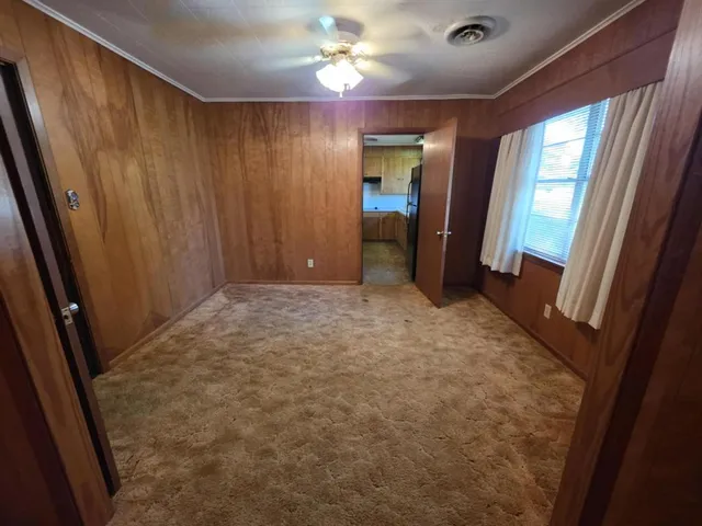 a view of hallway with livingroom