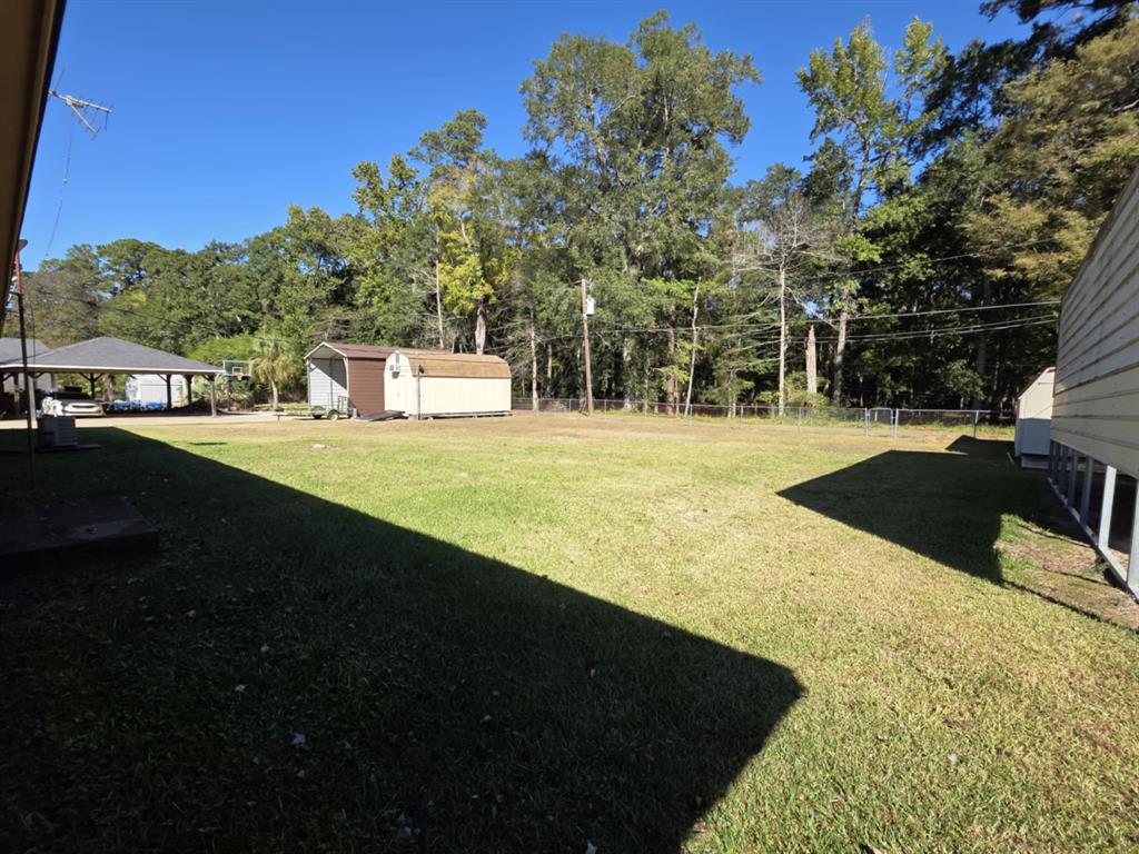 123 Frank Drive Logansport, LA 71049 - Photo 10 of 32 a view of an outdoor space and basketball court