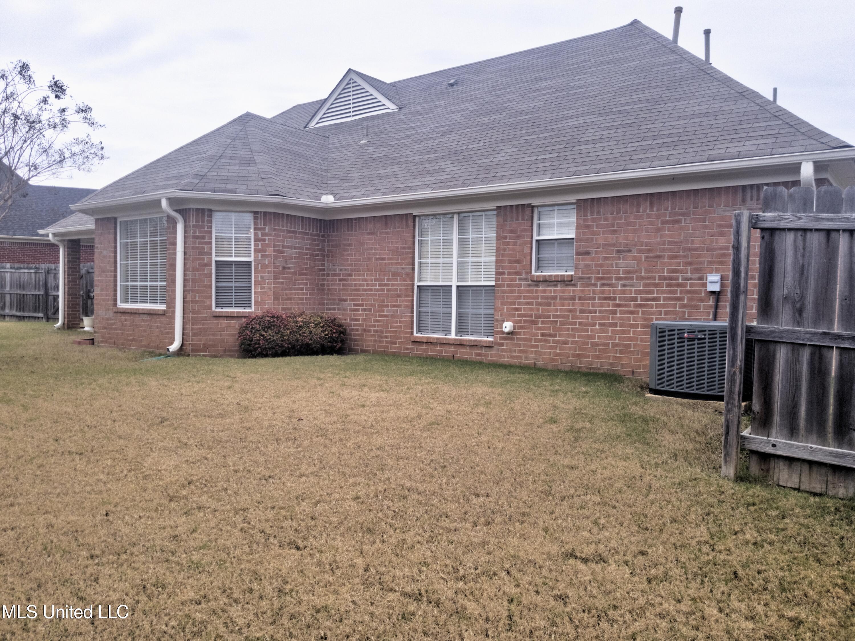 7703 Alexanders Ridge Cove Olive Branch, MS 38654 - Photo 9 of 10 7703 Alexaders Ridge Cv Rear Ext 2