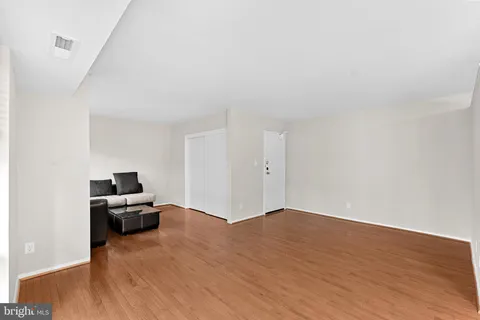 a bedroom with a bed and furniture