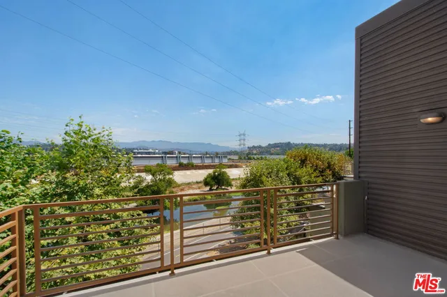 a balcony view with a outdoor space
