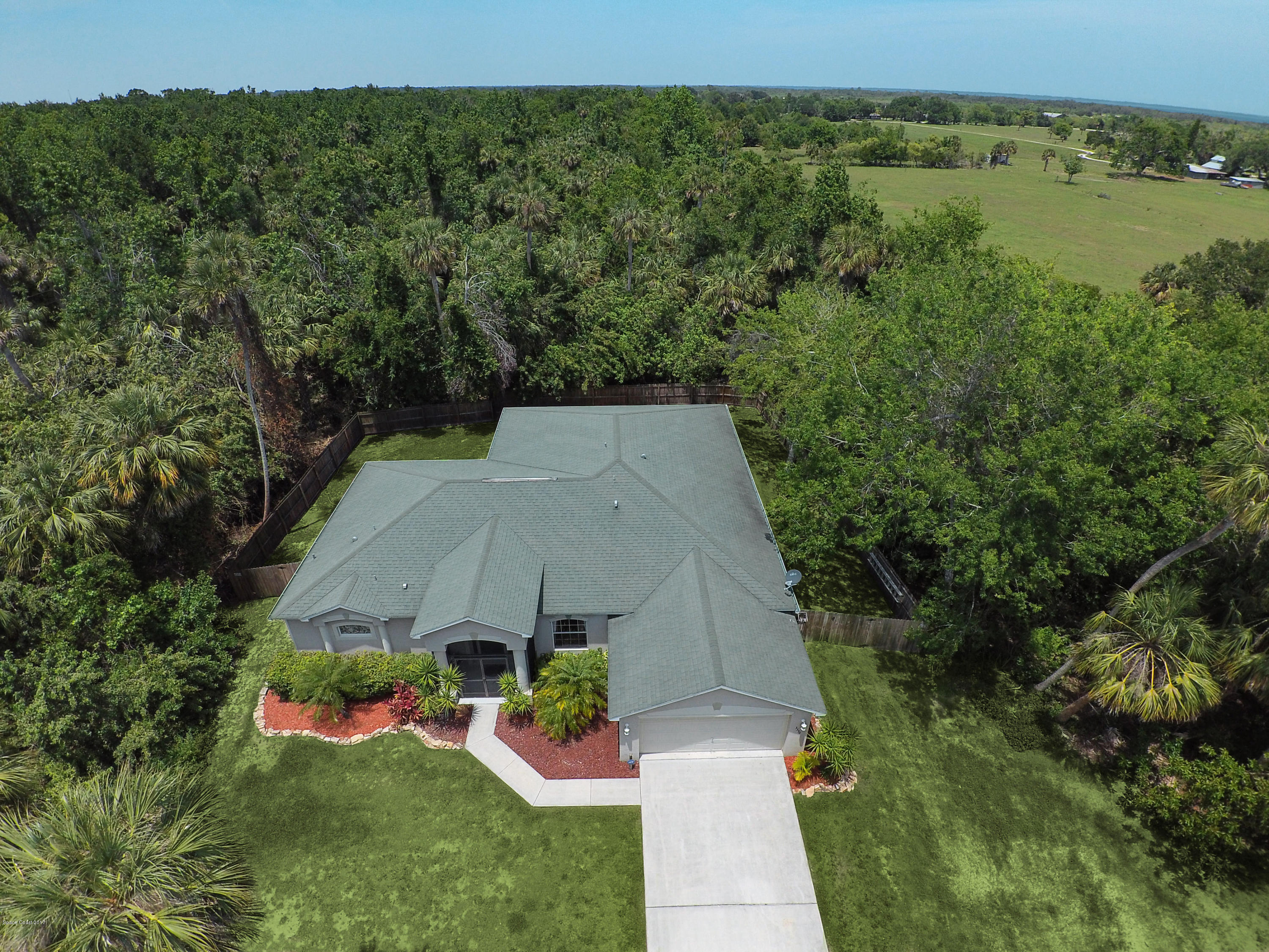 3330 Carter Road Mims, FL 32754 - Photo 2 of 37 an aerial view of a house