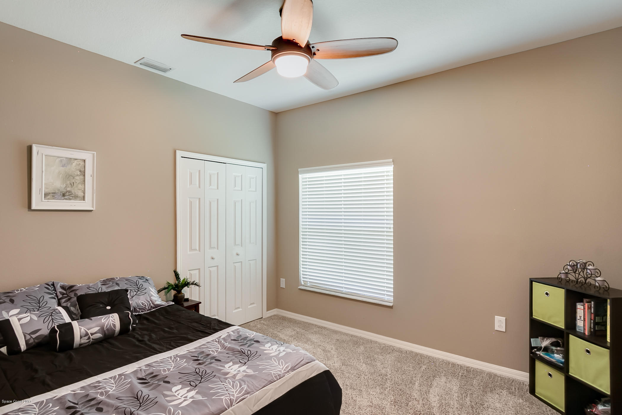 3330 Carter Road Mims, FL 32754 - Photo 26 of 37 a bedroom with furniture and a window