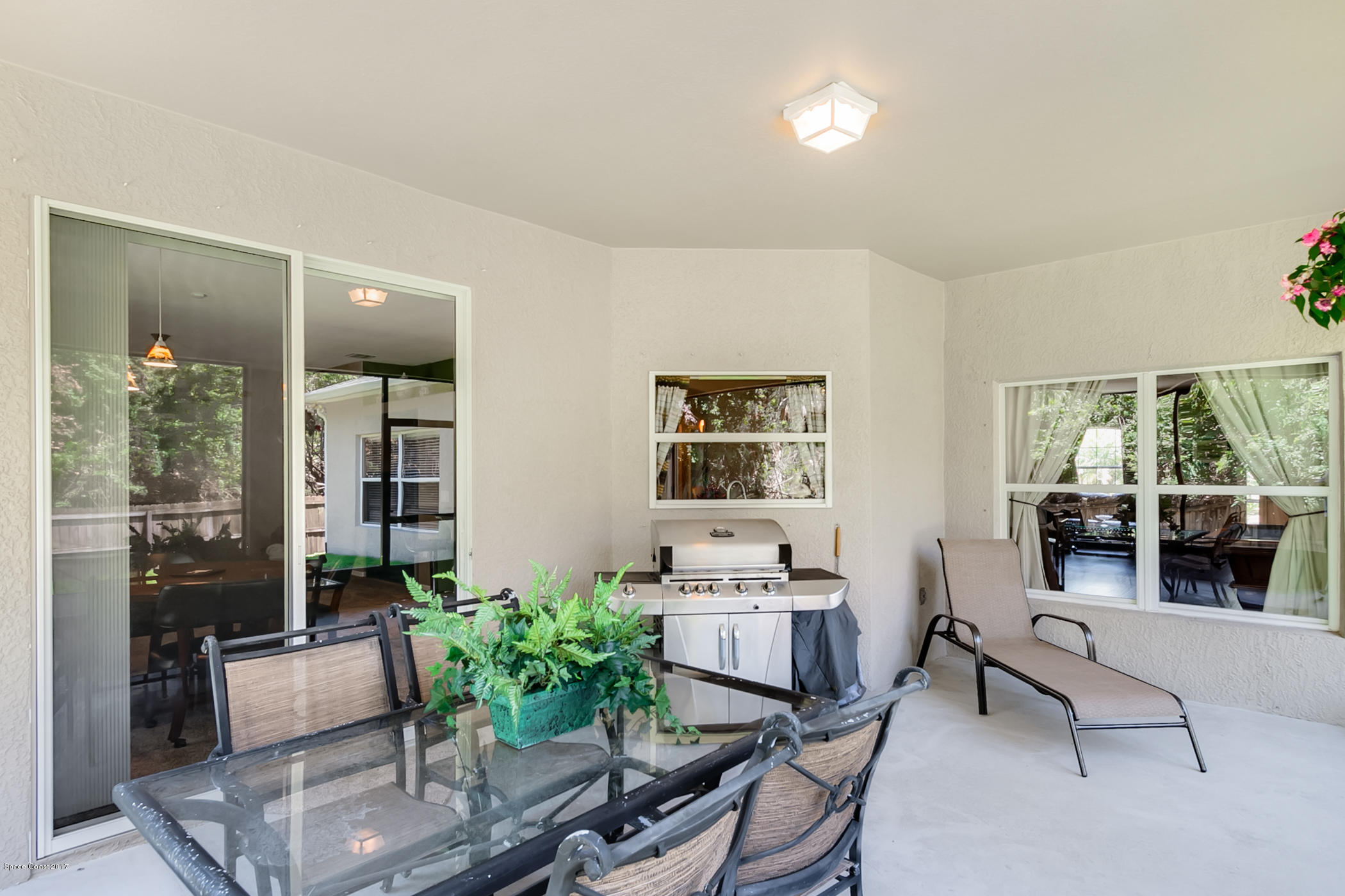3330 Carter Road Mims, FL 32754 - Photo 29 of 37 a living room with furniture and a potted plant