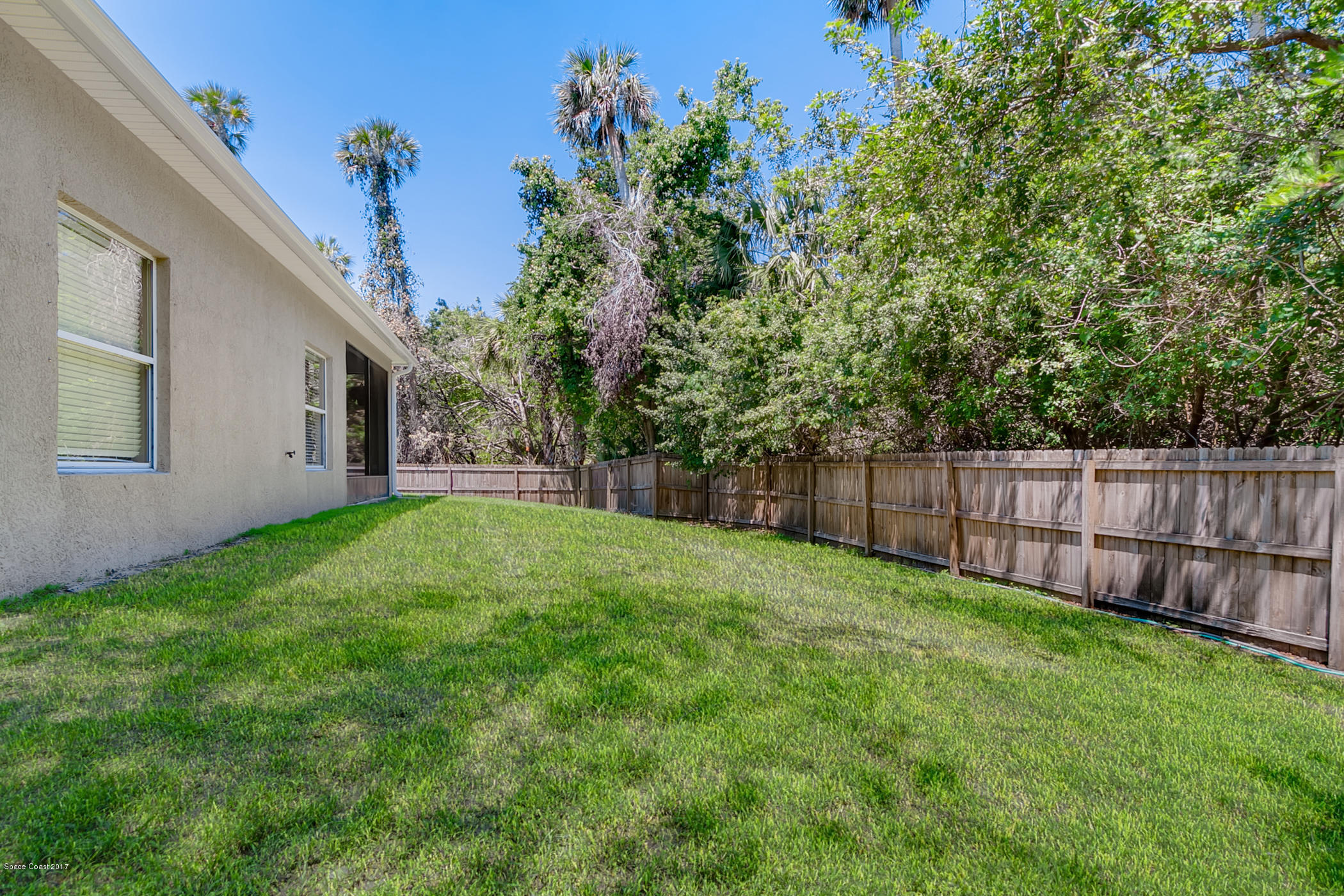 3330 Carter Road Mims, FL 32754 - Photo 33 of 37 a view of a backyard with a garden