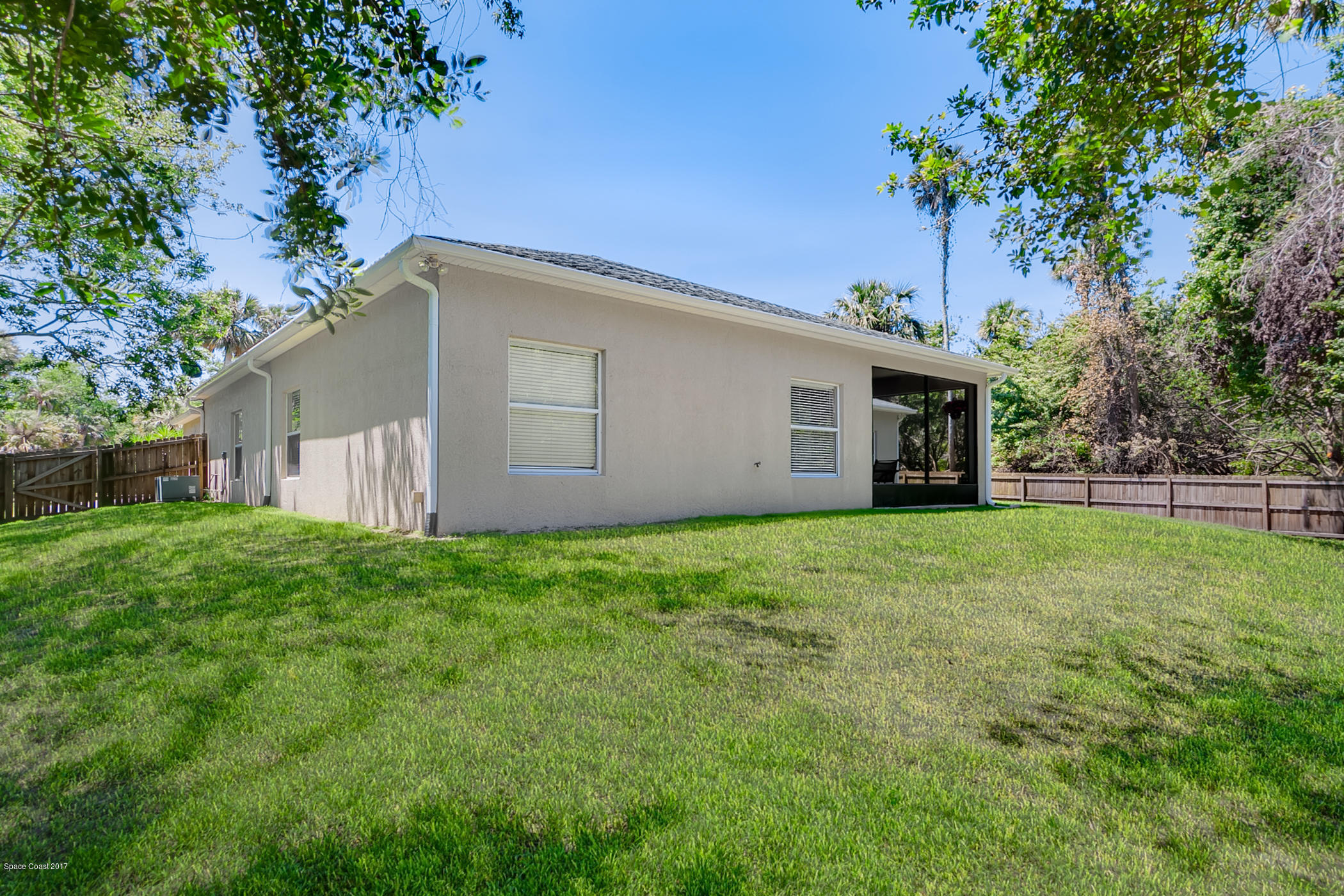 3330 Carter Road Mims, FL 32754 - Photo 34 of 37 a view of a house with backyard and garden
