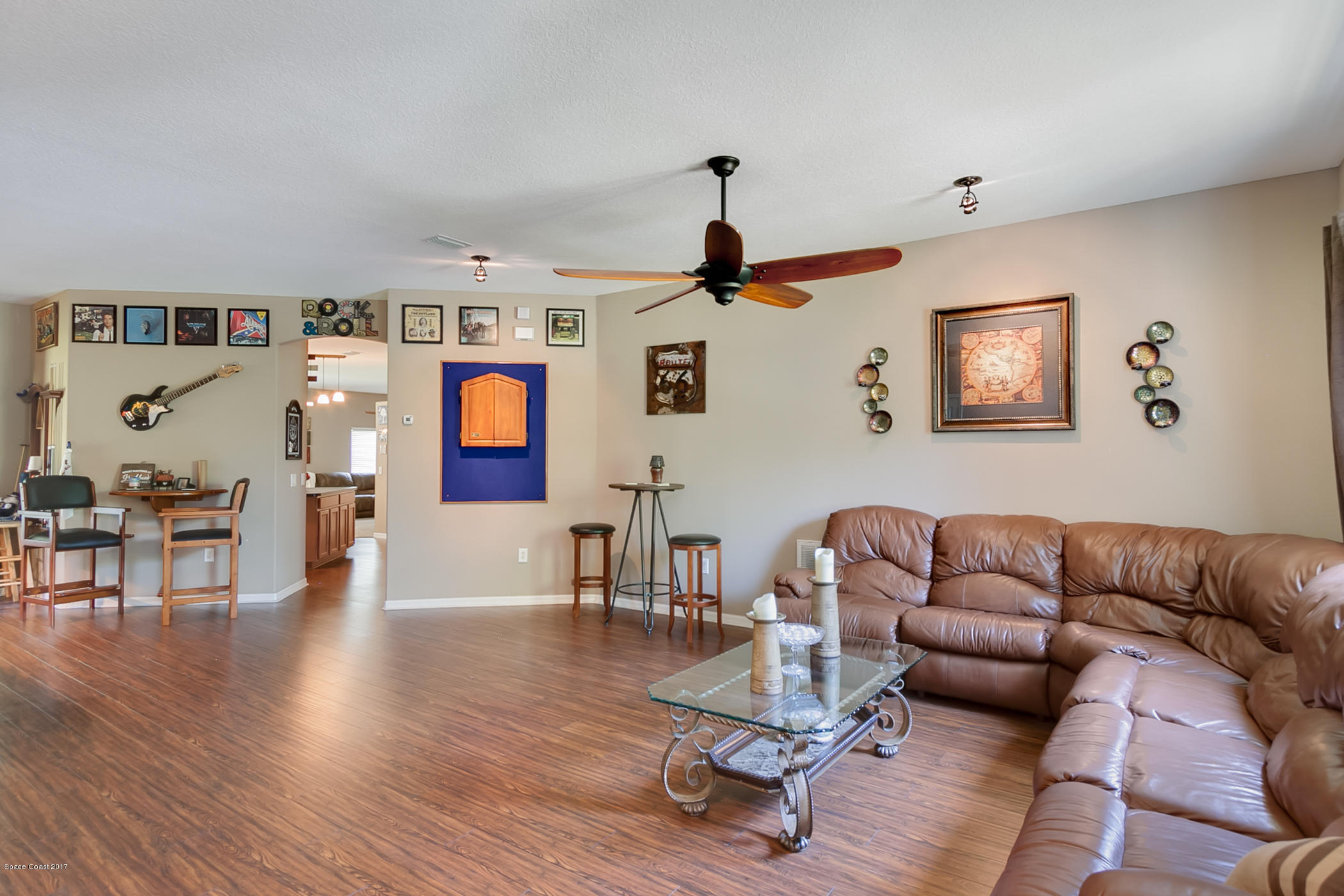3330 Carter Road Mims, FL 32754 - Photo 6 of 37 a living room with furniture and wooden floor