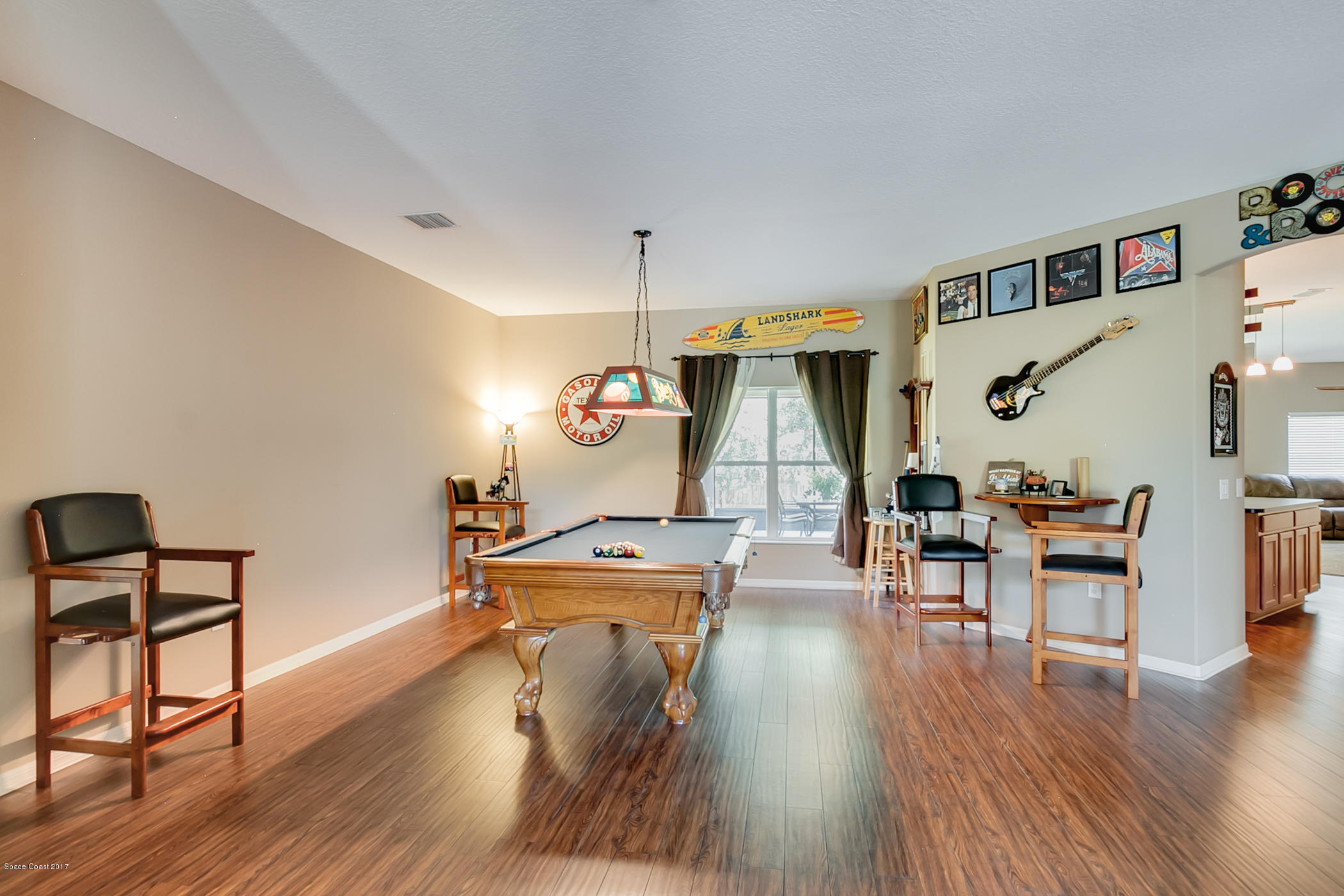 3330 Carter Road Mims, FL 32754 - Photo 8 of 37 a living room with furniture and a wooden floor