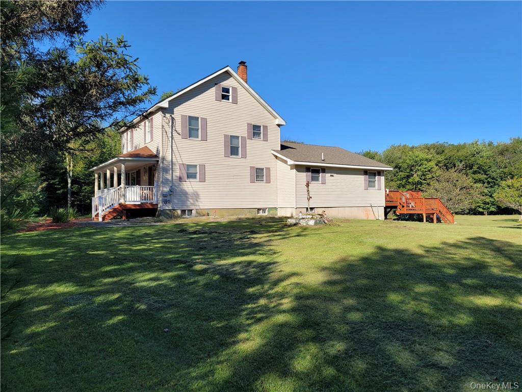 114 Levine Road Kiamesha Lake, NY 12751 - Photo 21 of 36 a front view of a house with a yard
