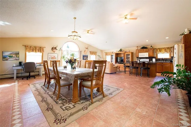 a view of a dining room with furniture
