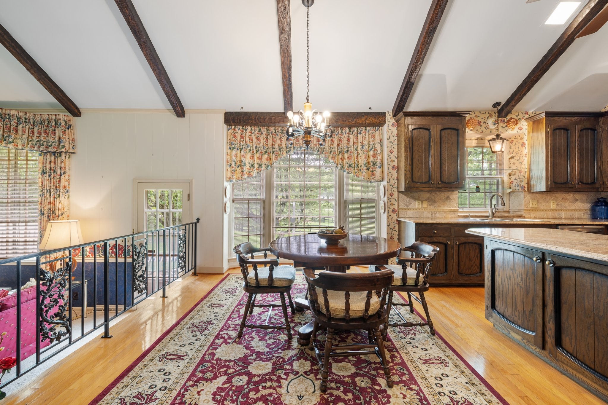 1409 Sneed Road West Franklin, TN 37069 - Photo 17 of 47 a view of a dining room with furniture window and wooden floor