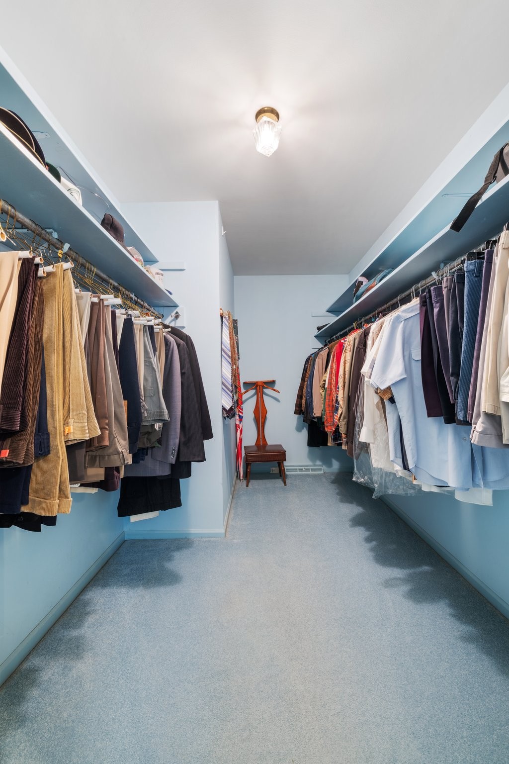 1409 Sneed Road West Franklin, TN 37069 - Photo 31 of 47 a view of walk in closet with clothes and shoes