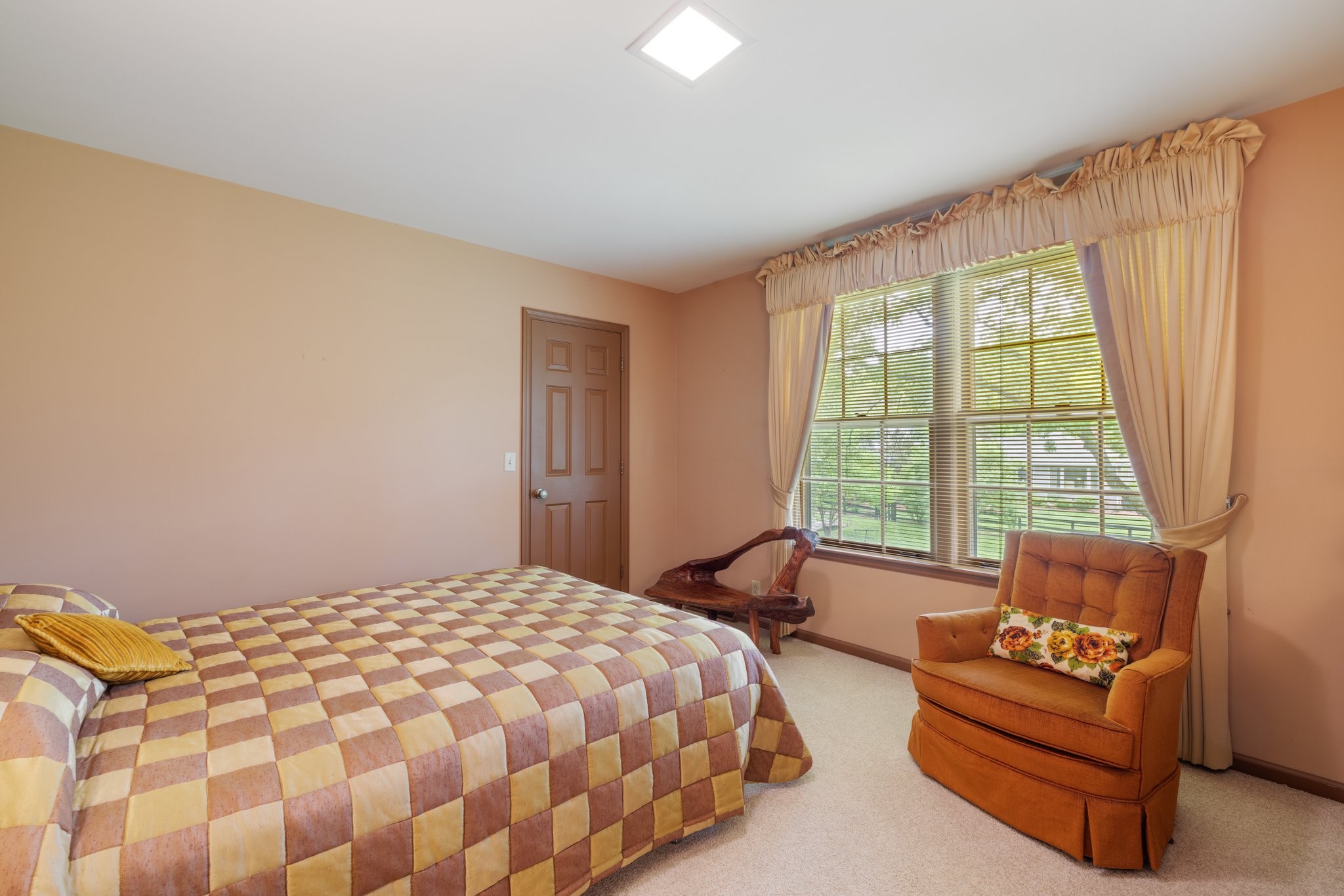 1409 Sneed Road West Franklin, TN 37069 - Photo 32 of 47 a bedroom with a bed and a couch next to a window