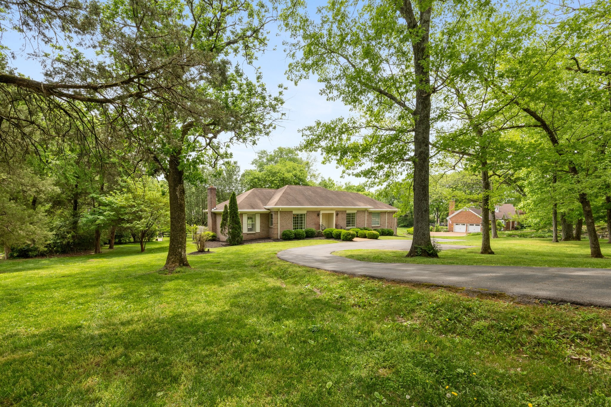 1409 Sneed Road West Franklin, TN 37069 - Photo 4 of 47 a view of a house with a yard