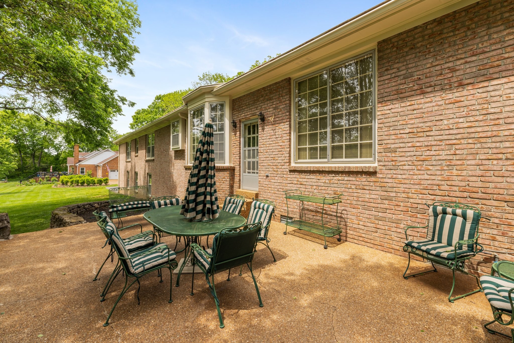 1409 Sneed Road West Franklin, TN 37069 - Photo 41 of 47 a view of a house with backyard and sitting area